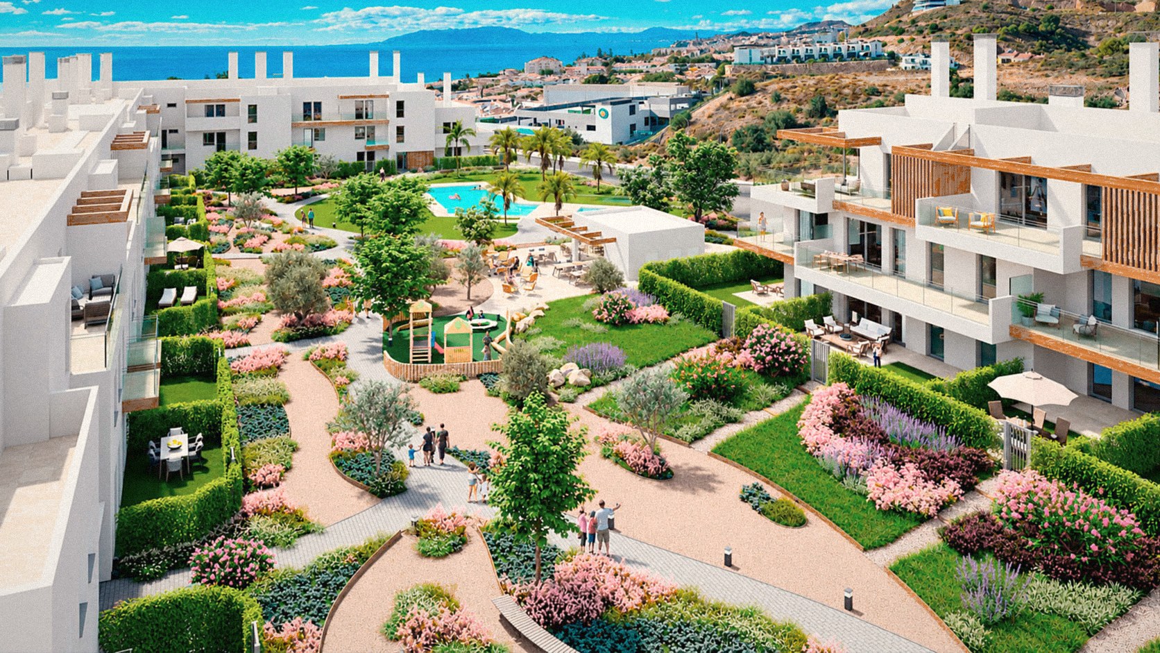 Complejo residencial junto al mar con jardines y zona infantil